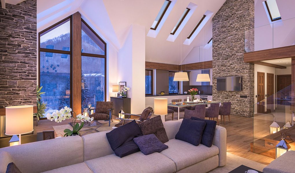 Rendering 3D przytulnego salonu w mroźną zimową noc w górach wieczorne wnętrze domku ozdobione świecami kominek wypełnia pomieszczenie ciepłem.