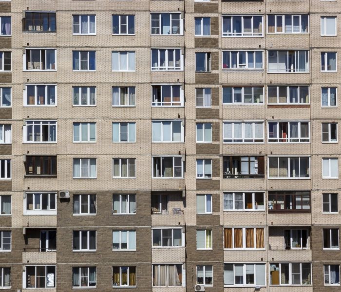 Ceglana fasada w świetle dziennym wieżowców Budynki mieszkalne Bloki mieszkalne Szczegół Tekstura Tło Sankt Petersburg Miasto Rosja